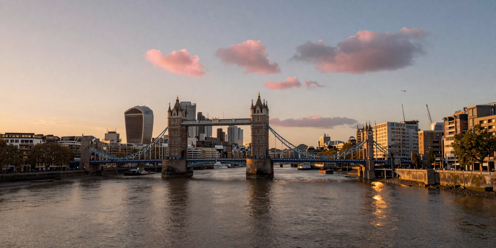 Romantic London skyline at golden hour with Tower Bridge over the Thames River