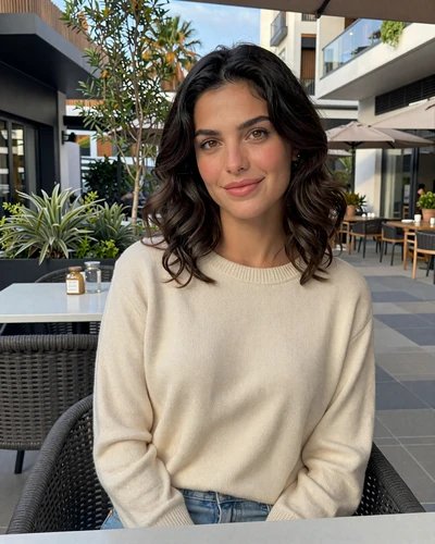 Niki, 28, modern career-driven Cypriot woman from Strovolos who balances professional ambition with traditional family values