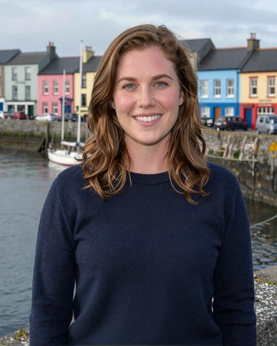 Niamh, 29, Irish woman from Galway on the west coast who loves the sea and seeks a big-hearted partner